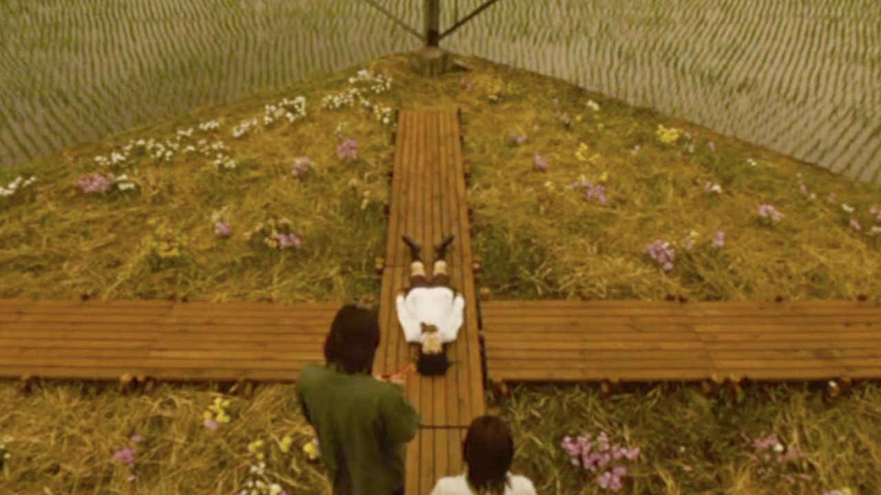 The Man Behind the Scissors backdrop