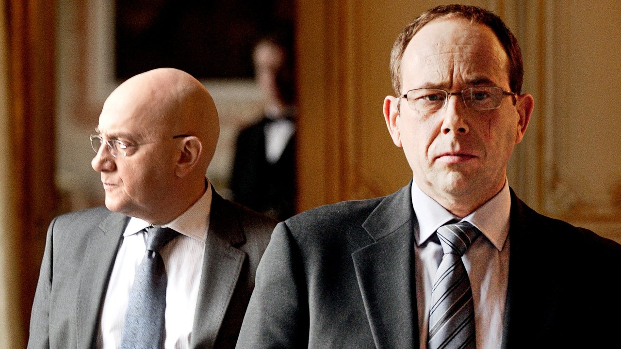 The Minister backdrop