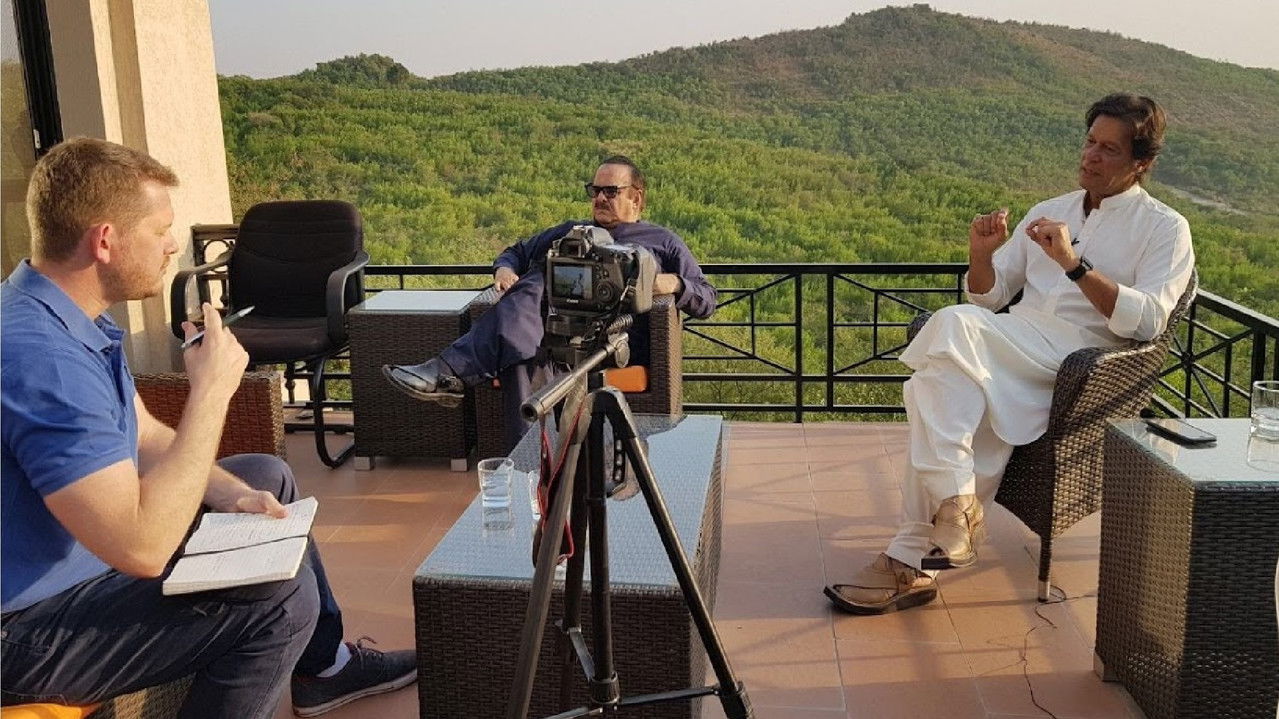 Dennis Does Pakistan backdrop