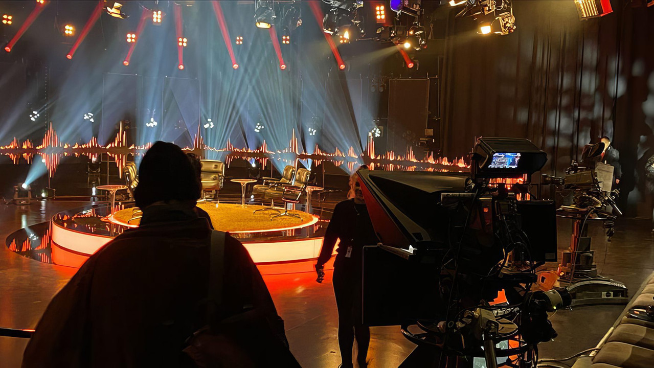 Somewhere in the crowd there's you backdrop