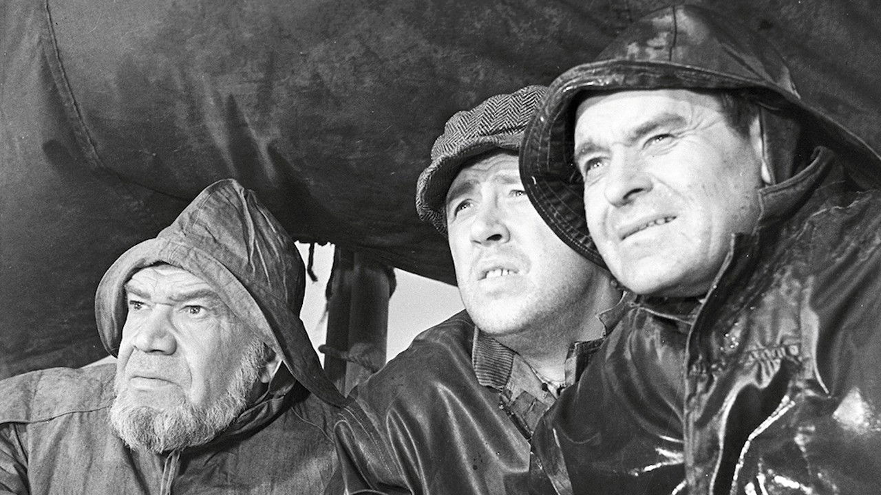 Men from the Fisherman's Village backdrop