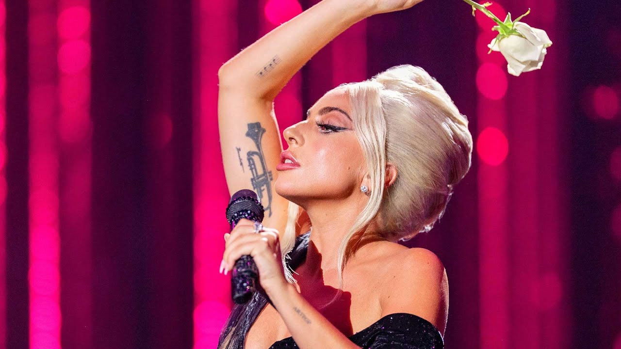 Lady Gaga Celebrates Love for Sale backdrop