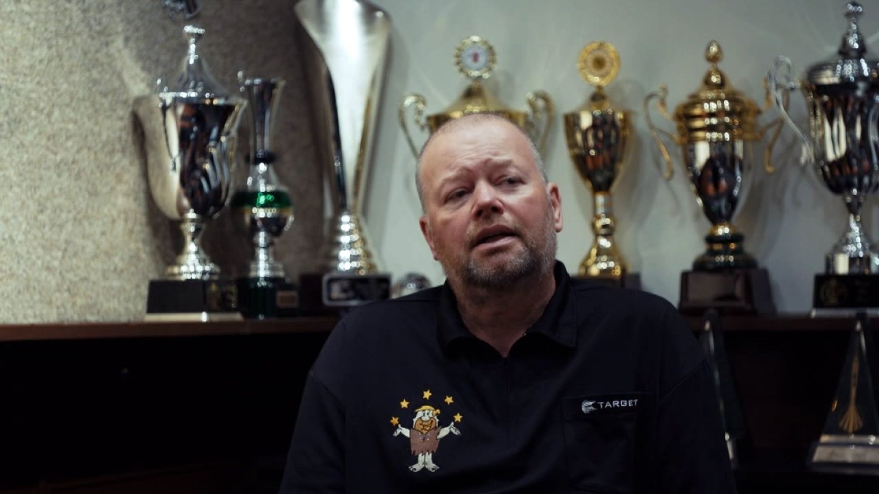 Barney: Het Verdriet van een Wereldkampioen backdrop