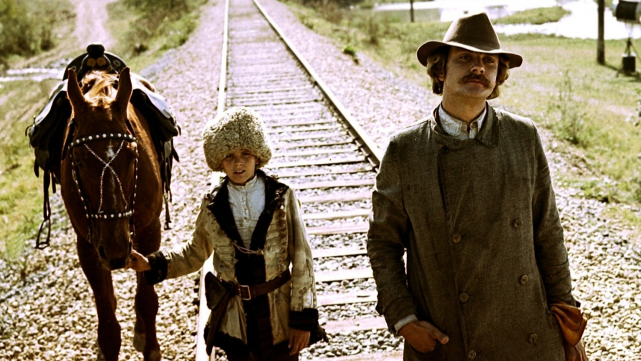 At Home Among Strangers, a Stranger Among His Own backdrop