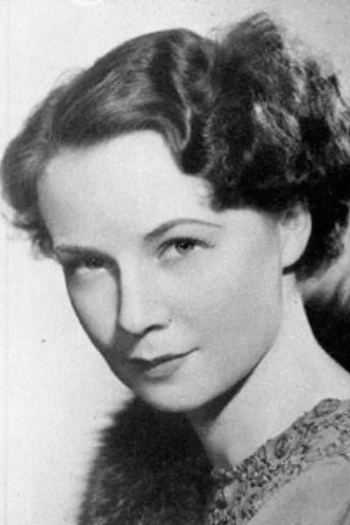 Katharine Page as Mrs. Harris