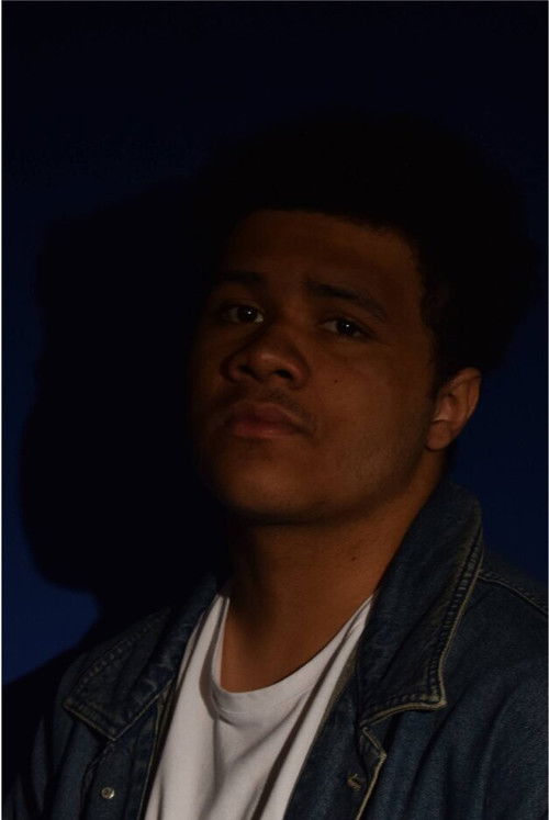 Jamal Augustine-Clarke as Forensic Scientist