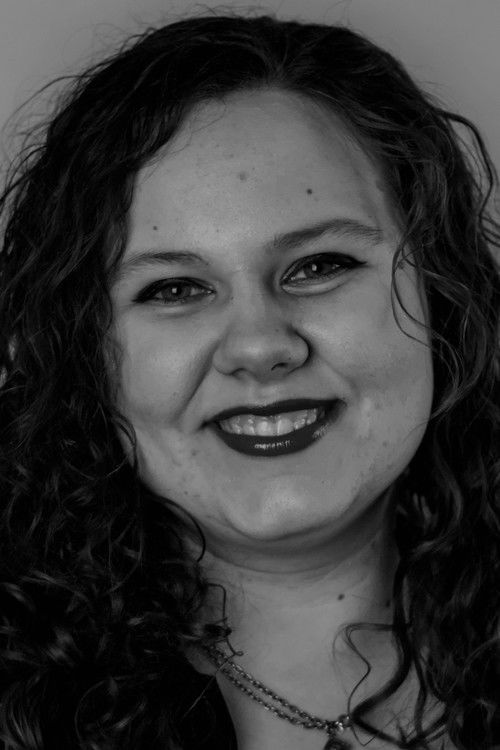 Morgan Heinlein as Lady with the curls