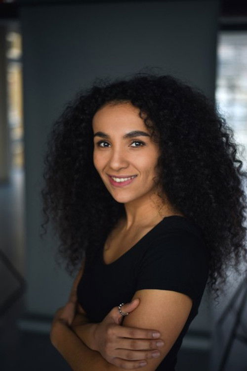 Veronique Coubard as Mrs. Roth