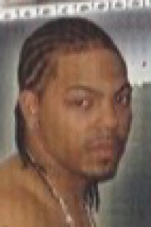 John B. as (archive footage)