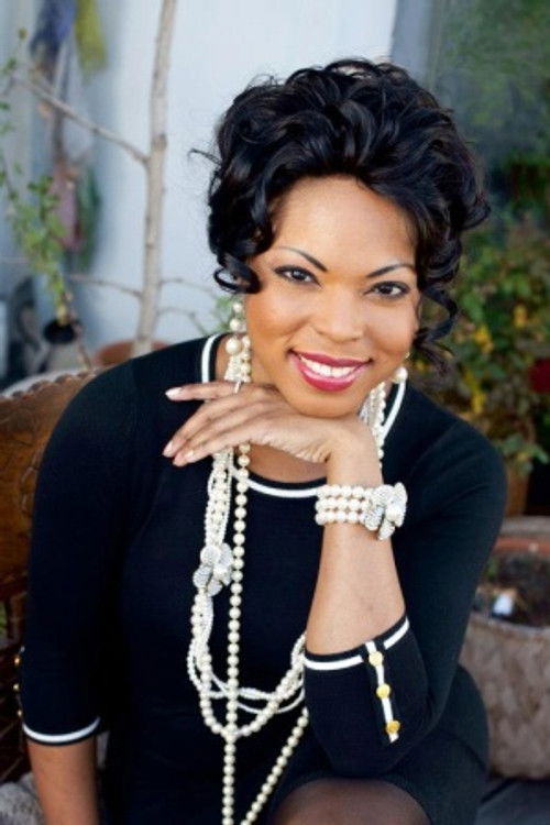 Kristin Lewis as Aida