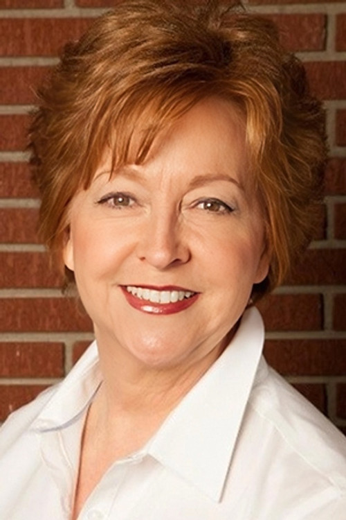 Connie Maynord as Tour Guide Polly