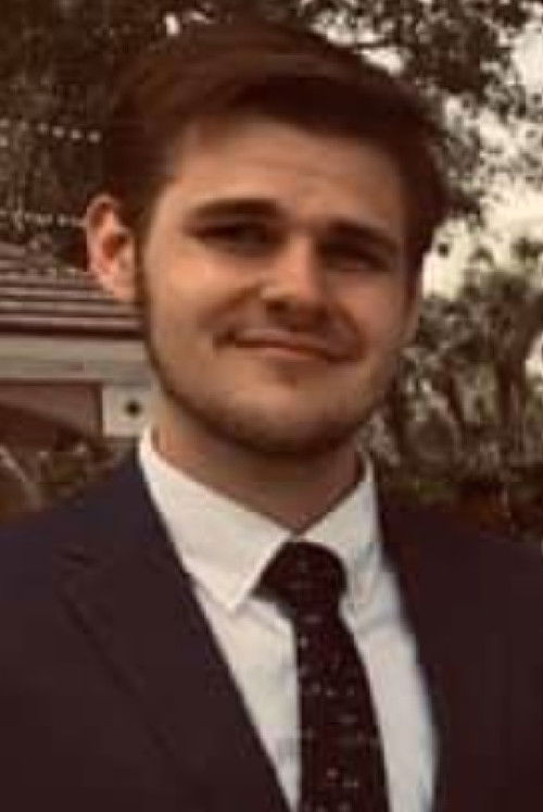 Timothy Triezenberg as Bruce Wayne