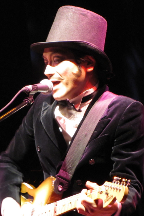 ROLLY as Muneo 'Genesis' Suzuki