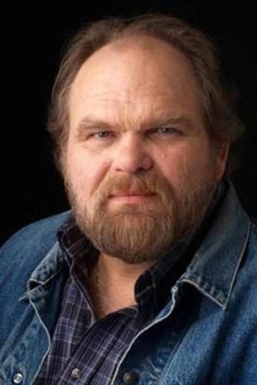 Douglas Roy Dack as Russell