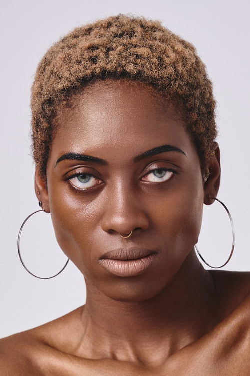 Flora Sylvestre Joseph as Azú