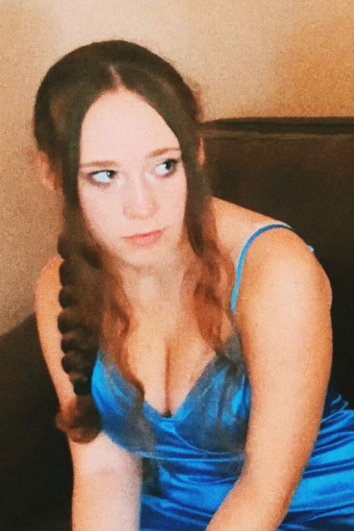 Macie Helwig as The Wife