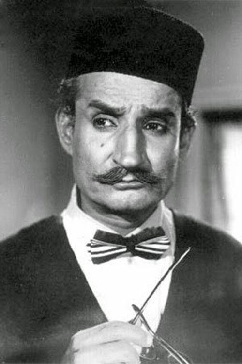Jeevan Dhar as Manikbabu (Shyama's dad)
