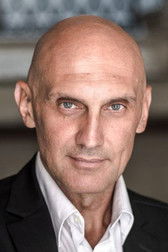 Oleksandr Polovets as Kuzia