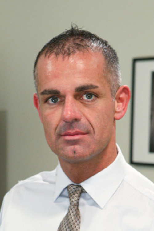 John Marcus as (archive footage)