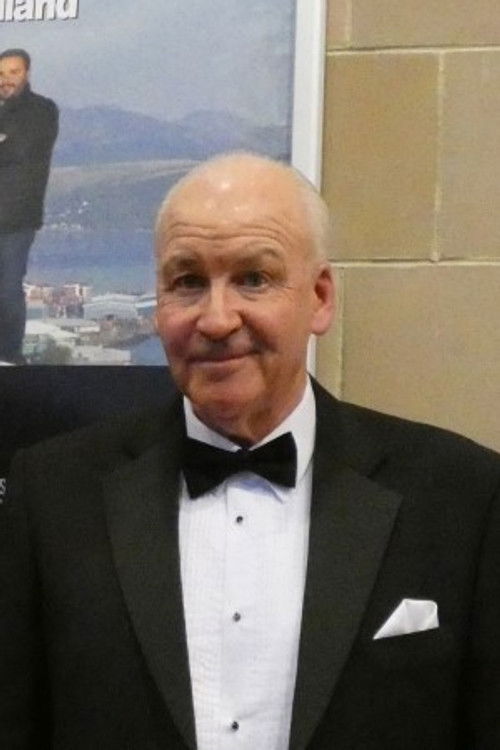 Joe Scott as Malcolm Lyons