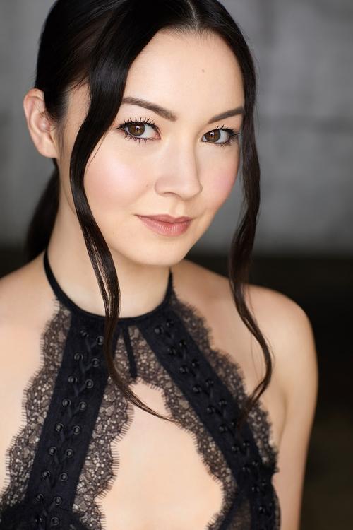 Ashley Park as Rhianna