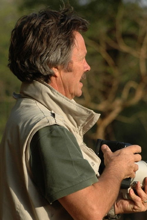 Jonathan Scott as Narrator (voice)