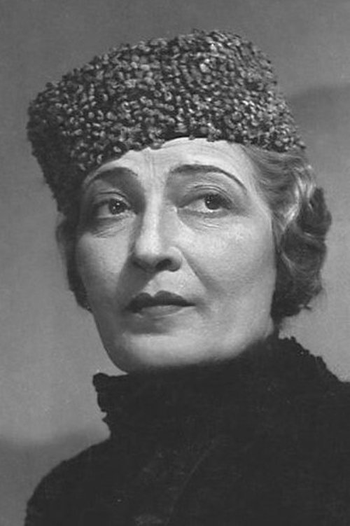 Jarmila Kronbauerová as majitelka koberce Eleonora Zanelli