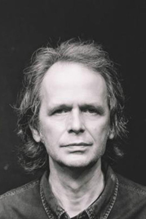 Thodoris Polizonis as Trofokoilias / German / Musician