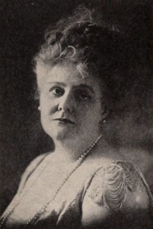 Dora Mills Adams as Mrs. De Veaux