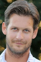 Marcin Janos Krawczyk as ksiądz