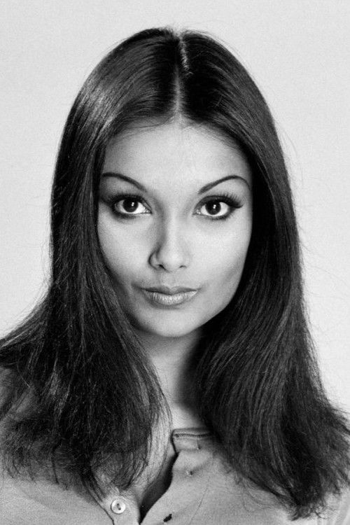 Shakira Caine as Karl's Friend (uncredited)