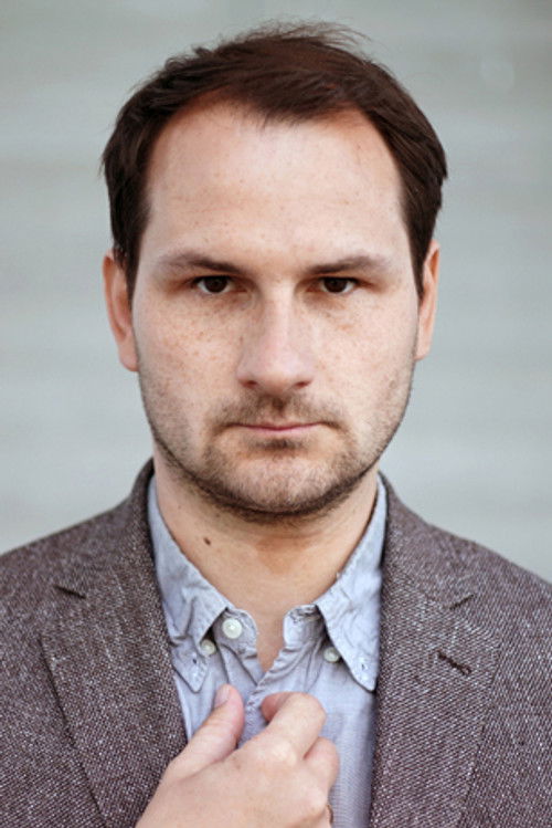 Daniel Flieger as Roger Burlitz