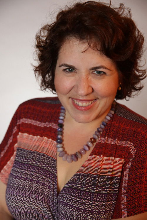 Kori A. Lusignan as Voice on CD