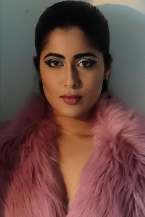 Nikita Sharma as Madhvi