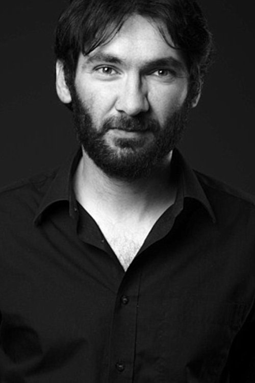 Malcolm Galea as Custom's Official