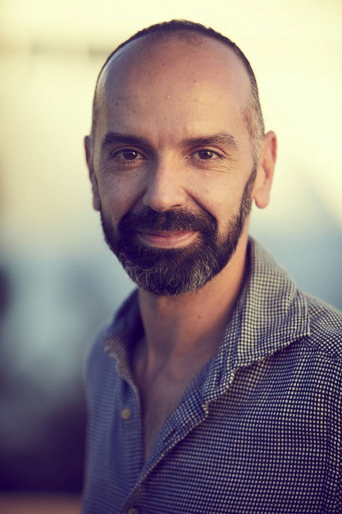 Jorge Muriel as Front Desk Clerk