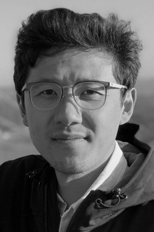 Xing-Mai Deng as Mr. Yu