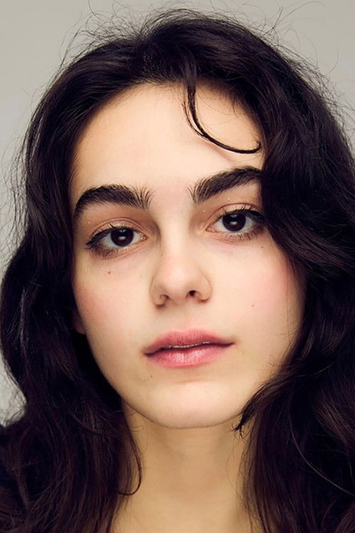 Stella Marcus as Iris