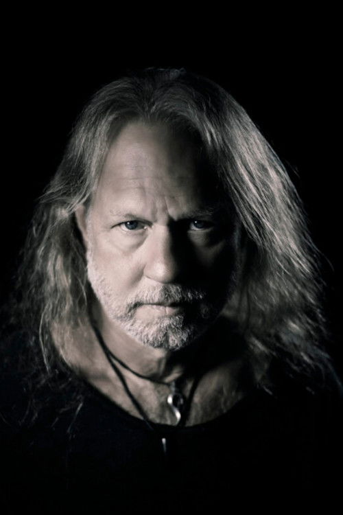 Toby Tarrach as Drums