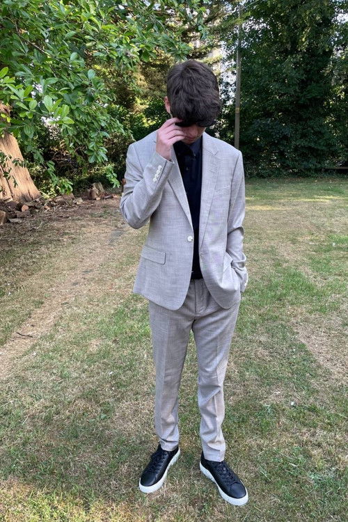 Tom Skoines as The Revolution.