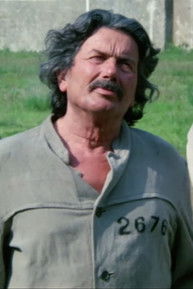 Freddy Logart as Cafè Client (uncredited)