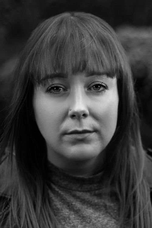 Charlie Clarke as Carol from HR