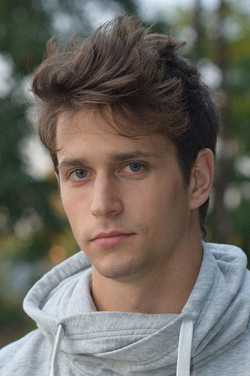 Michał Malinowski as Adam