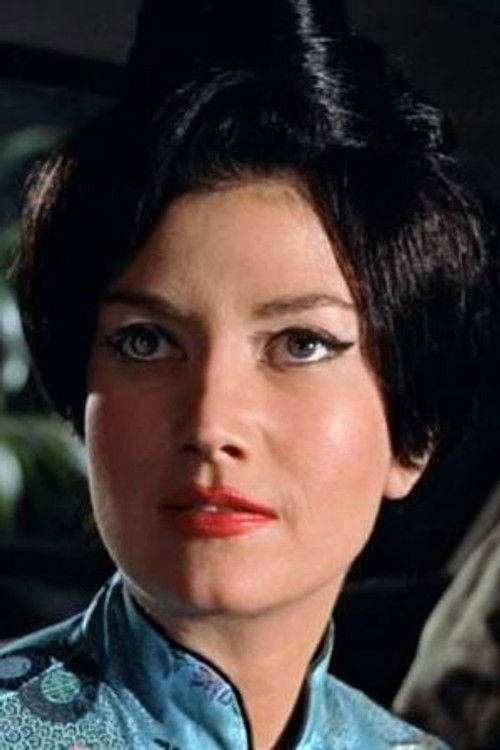 Zena Marshall as Caroline Markham