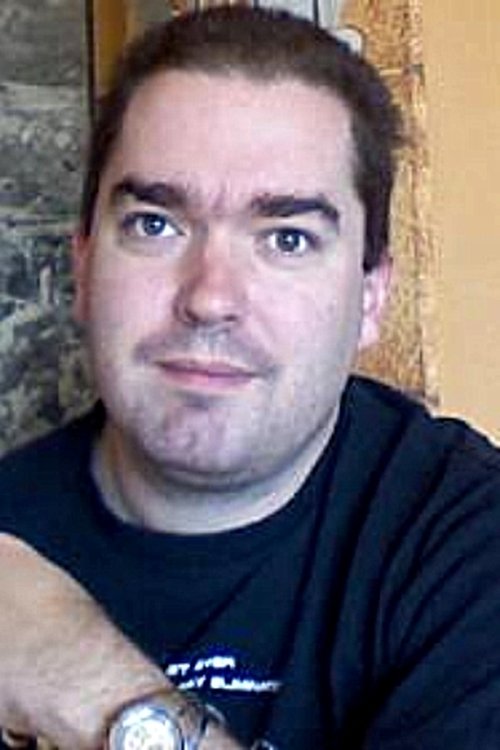 Luke Y. Thompson as Orange Vest