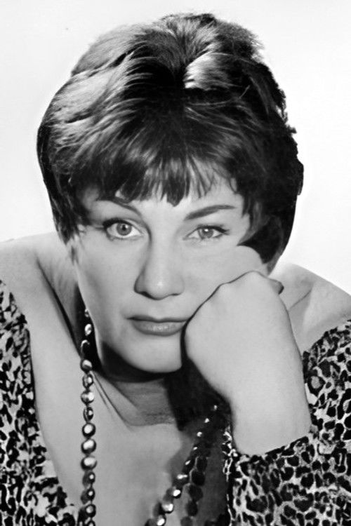 Dominique Davray as Barmaid (uncredited)