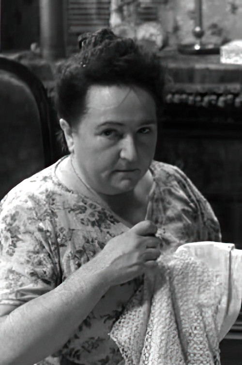 Jane Pierson as Philomène, concierge