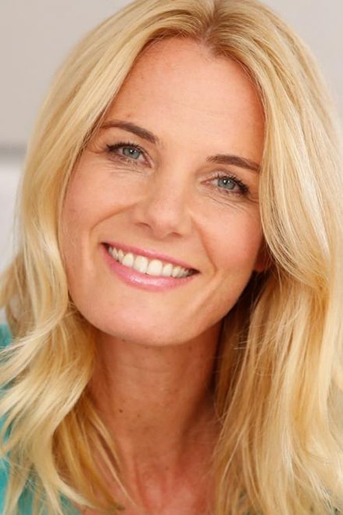 Trie Donovan as Newscaster