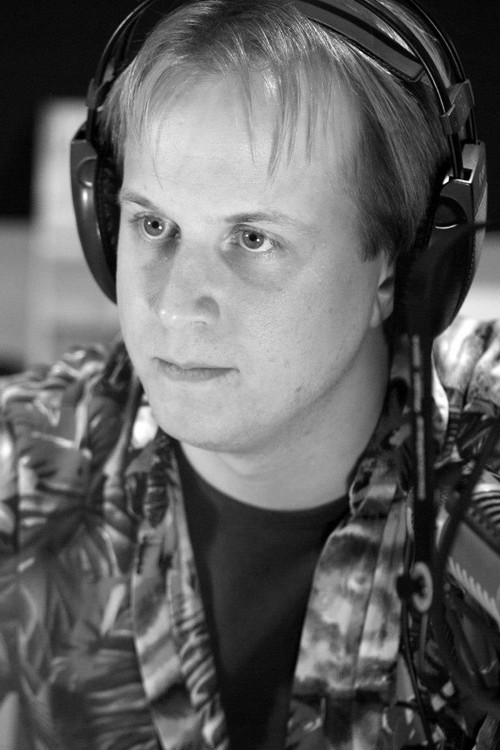 Jonathan C. Legat as Dennis