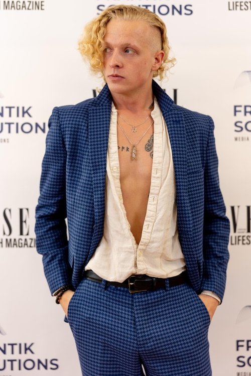 Rae Serbeck as Cafe Patron